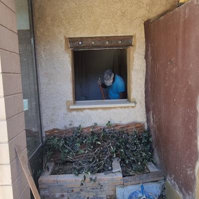 Restauration d'un puit et ouverture fenêtre mur en pierre