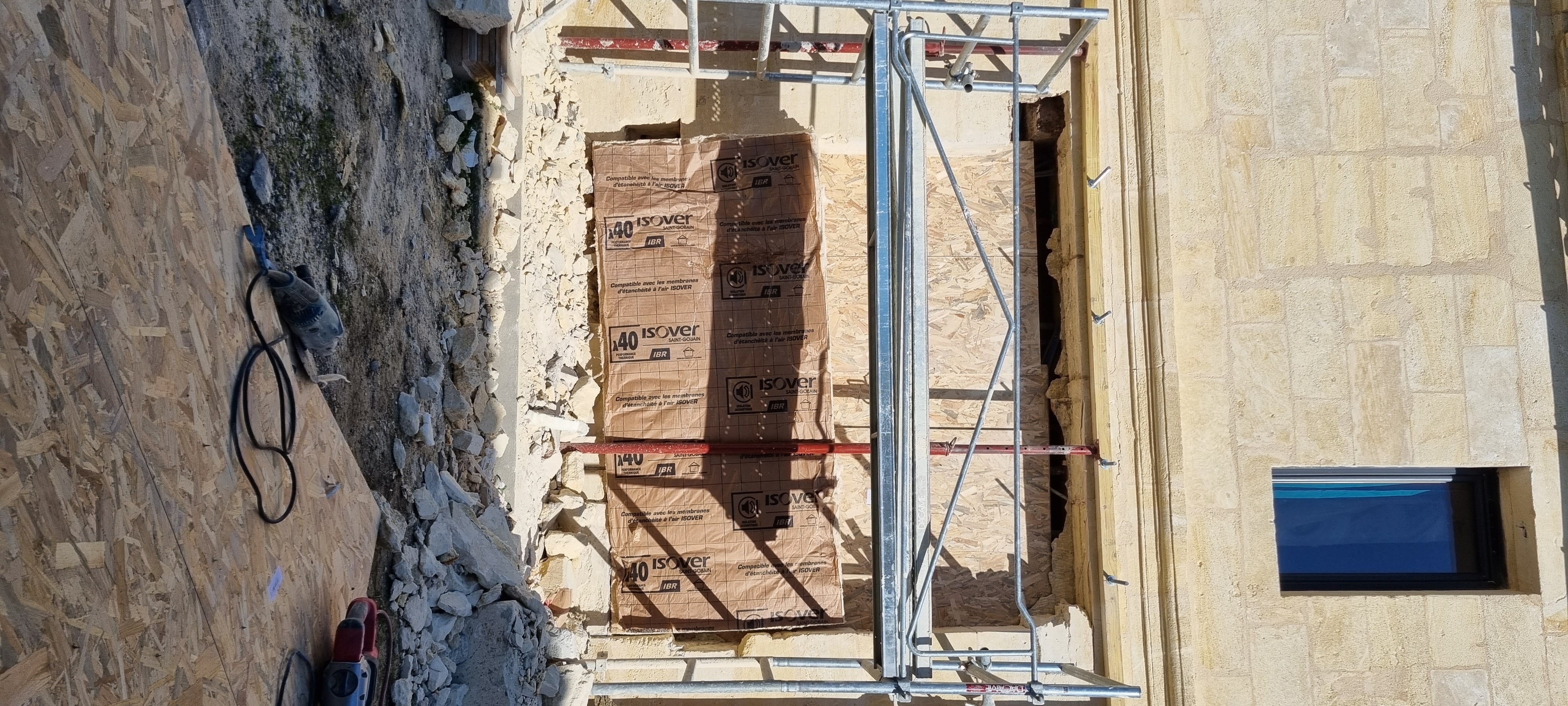 Ouverture mur pierre de taille en façade