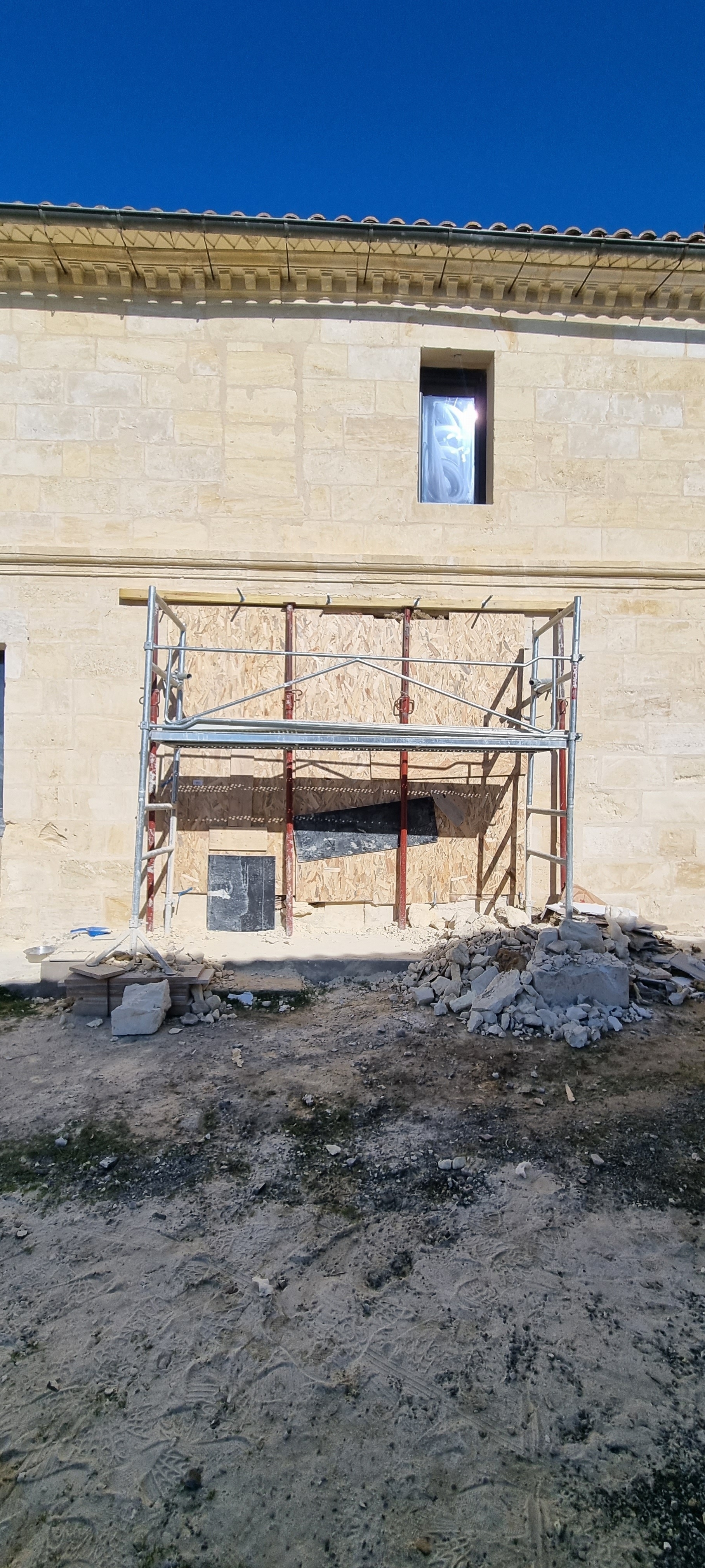 Ouverture mur pierre de taille en façade