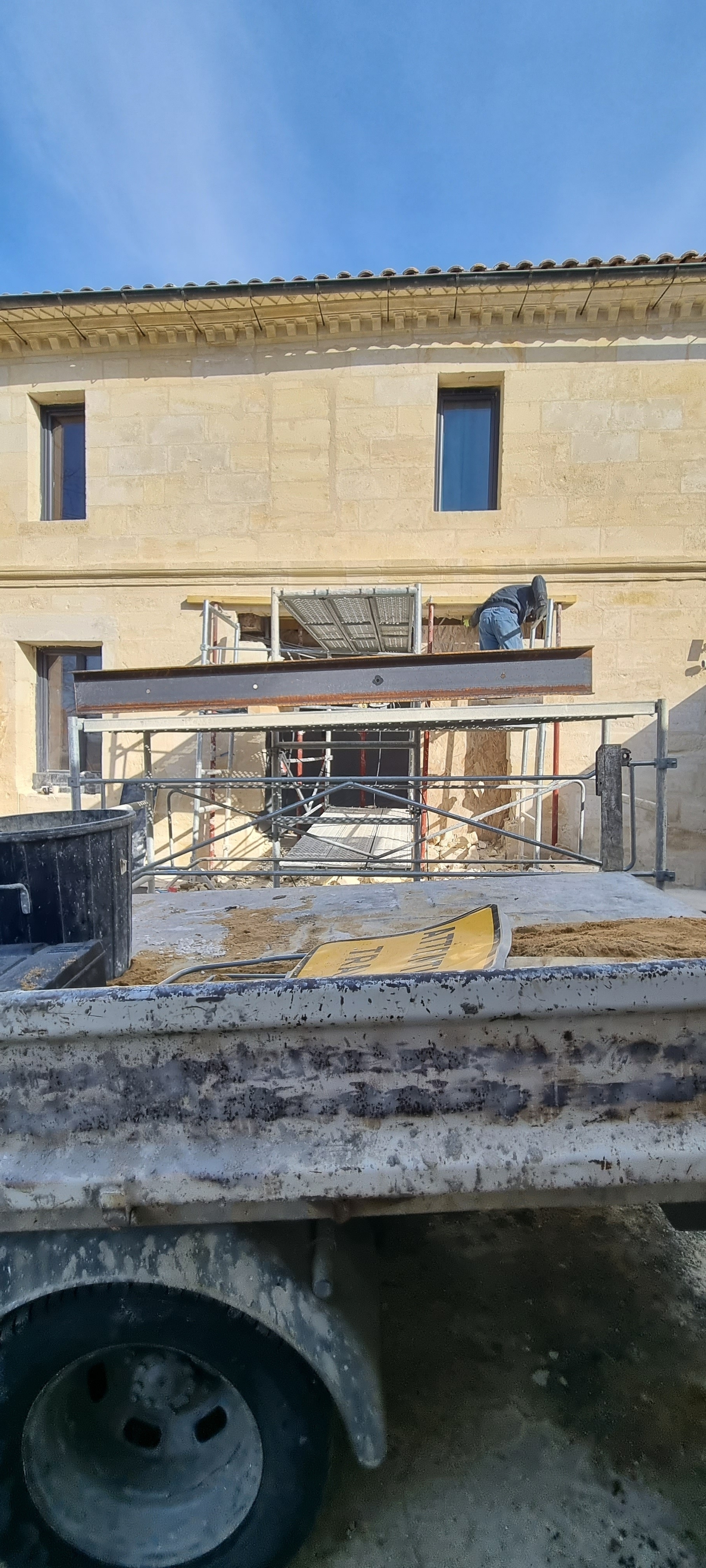 Ouverture mur pierre de taille en façade