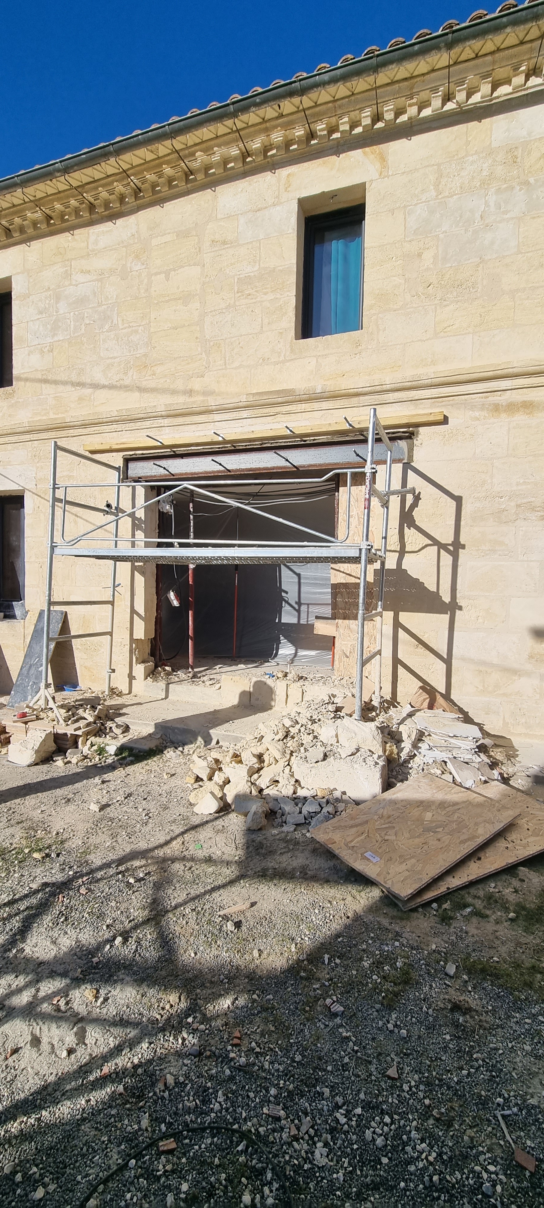 Ouverture mur pierre de taille en façade