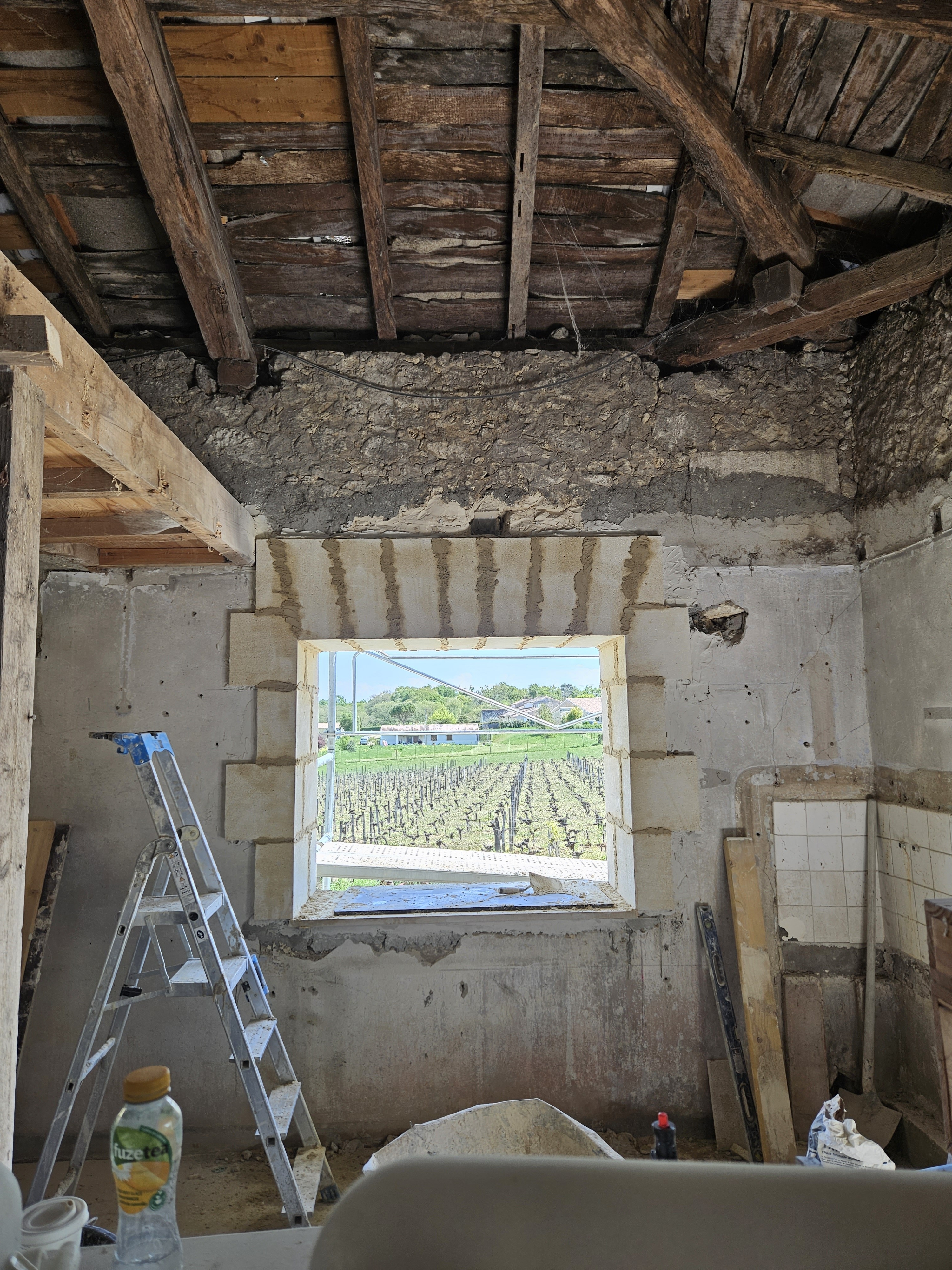 Ouverture mur en moellon placage pierre