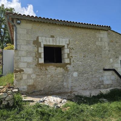 Ouverture mur en moellon placage pierre