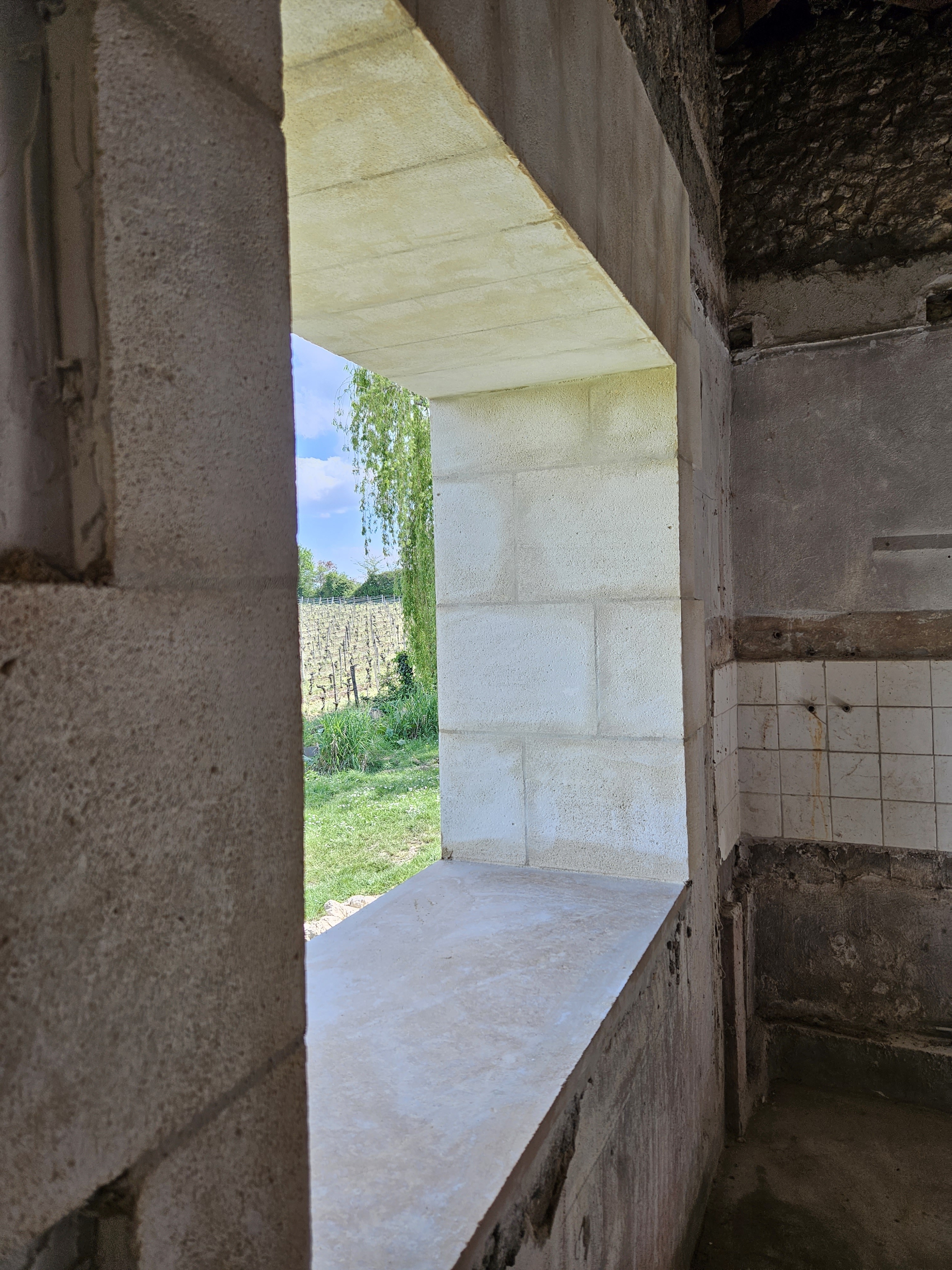 Ouverture mur en moellon placage pierre