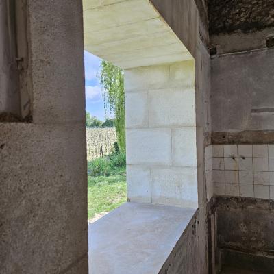 Ouverture mur en moellon placage pierre